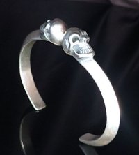 Half Floating Skull Triangle Wire Bangle