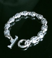 Quarter 11 Slant Head Skull Links Bracelet