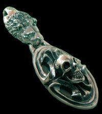 Lion & Sculpted Oval On Skull Pendant