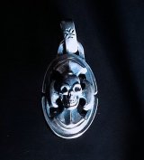 Quarter Battle Ax On Skull With H.W.O Pendant