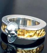 Pure Gold Wrap Twelve Small Skull On 7.5mm Wide Side Flat Chiseled Reel Ring