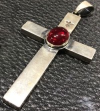 Cabochon Cut Ruby On Plain Cross Pendant